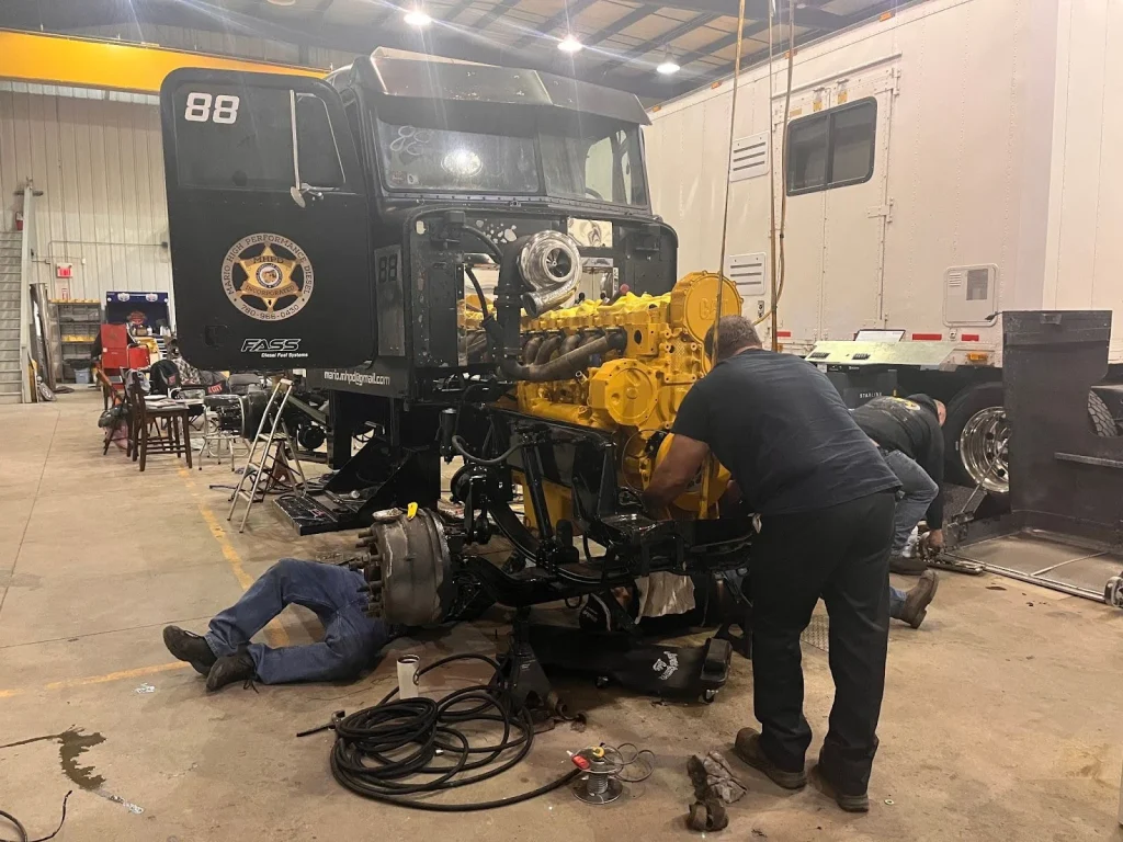 Guys working on the truck